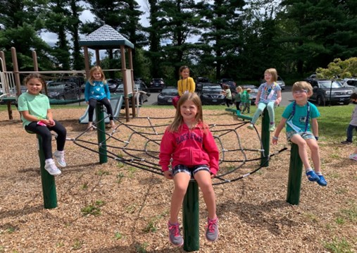 Students playing outside on the playground